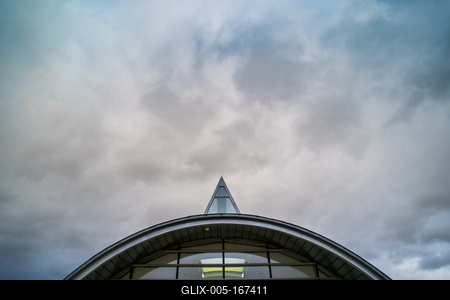 roof windows on a modern building  with cloudy sky-stock-foto