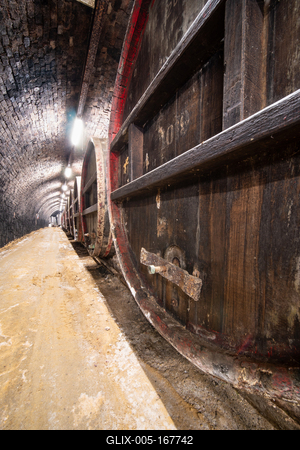 wooden barrels in old winery-stock-foto