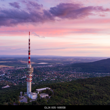 TV tower in Pecs Hungary with Mecsek hills-stock-foto