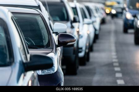 Many cars travelling on a road-stock-foto