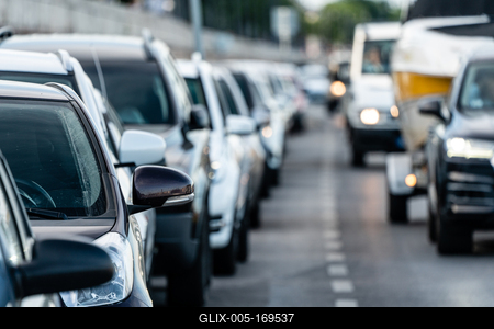 Many cars travelling on a road-stock-foto