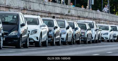 Many cars travelling on a road-stock-foto