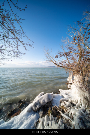 Beautiful frozen Lake Balaton with steel steps-stock-foto