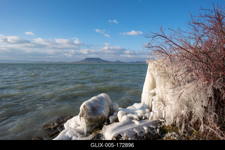 Beautiful frozen Lake Balaton with steel steps-stock-foto