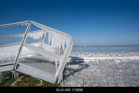 Beautiful frozen Lake Balaton with steel steps-stock-foto