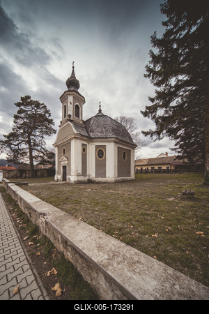 Small chapel with stormy clouds, before rain-stock-foto