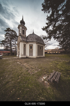 Small chapel with stormy clouds, before rain-stock-foto