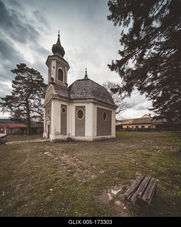 Small chapel with stormy clouds, before rain-stock-foto