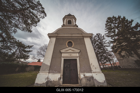 Small chapel with stormy clouds, before rain-stock-foto