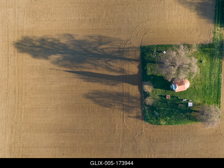 aerial photo of a small chapel with morning sunshine-stock-foto