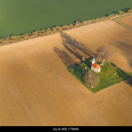 aerial photo of a small chapel with morning sunshine-stock-foto