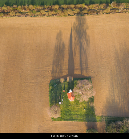 aerial photo of a small chapel with morning sunshine-stock-foto