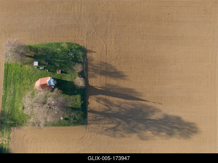 aerial photo of a small chapel with morning sunshine-stock-foto