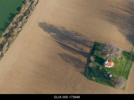 aerial photo of a small chapel with morning sunshine-stock-foto