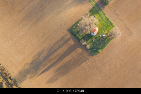 aerial photo of a small chapel with morning sunshine-stock-foto