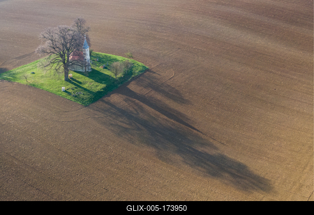 aerial photo of a small chapel with morning sunshine-stock-foto