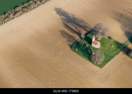 aerial photo of a small chapel with morning sunshine-stock-foto