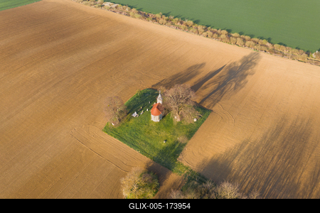 aerial photo of a small chapel with morning sunshine-stock-foto