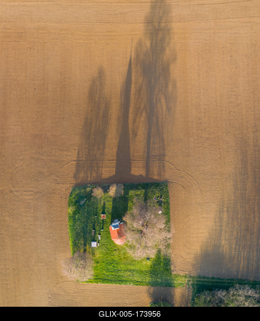 aerial photo of a small chapel with morning sunshine-stock-foto
