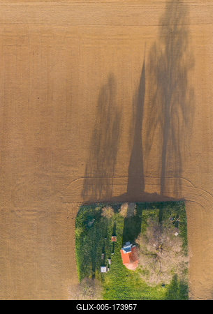 aerial photo of a small chapel with morning sunshine-stock-foto