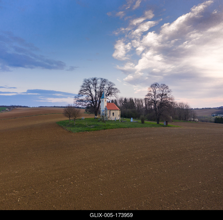 aerial photo of a small chapel with morning sunshine-stock-foto