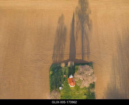 aerial photo of a small chapel with morning sunshine-stock-foto