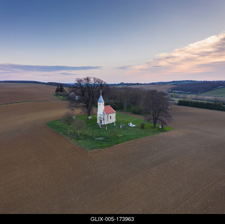 aerial photo of a small chapel with morning sunshine-stock-foto