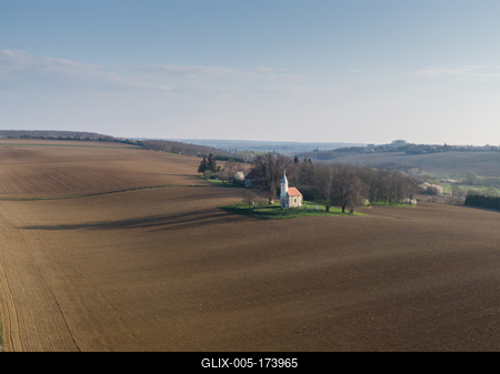 aerial photo of a small chapel with morning sunshine-stock-foto