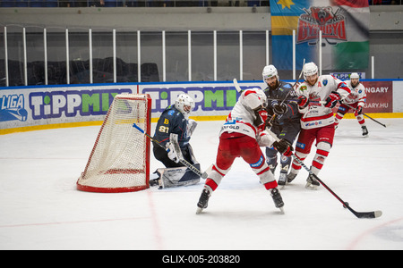 BUDAPEST - FEBRUARY 2: MAC Budapest (Budapest Jégkorong Akadémia Hockey Club) (blue) and Gyergyoi HK  (white) ice hockey teams participate in Championship, February 2, 2024 in Budapest, Hungary.-stock-foto