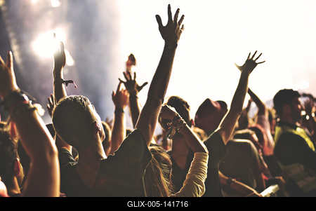 Rear view of crowd with arms outstretched at concert-stock-foto