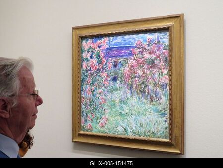 Claude Monet festménye: Ház a rózsák között-stock-foto