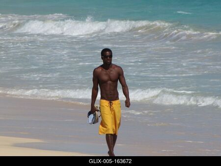 Cape Verde - African man walking on the Beach-stock-foto