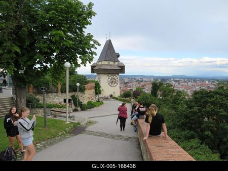 Tourists at Clock Tower - Graz - Austria-stock-foto