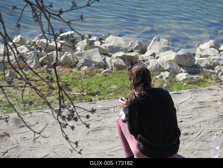 Lonely girl - Spring - Danube river-stock-foto