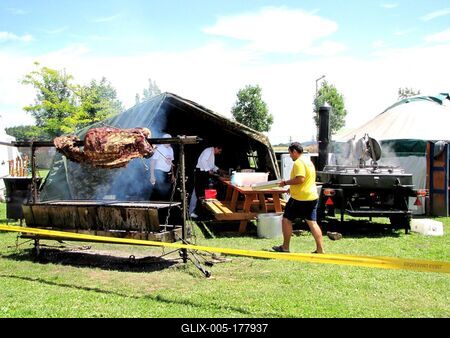 Ox roasting on the Aqua City beach in Zalaegerszeg - Hungary-stock-foto
