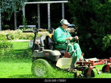 Mechanical lawn mowing on Margaret Island - Budapest - Hungary-stock-foto