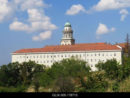 The high school dormitory of the Pannonhalma Archabbey and the tower of its basilica - Hungary-stock-foto