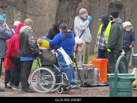 Woman in wheelchair waiting for food distribution - Hungary-stock-foto