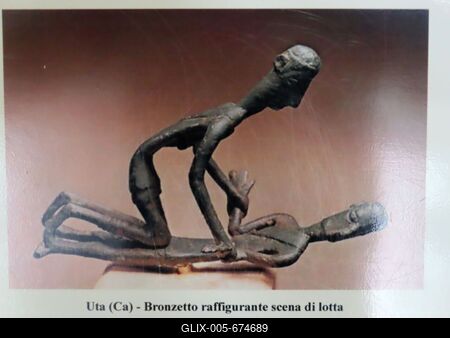 Nuragh sculpture depicting wrestlers in the Zapata museum in Barumini - Sardnia - Italy-stock-foto