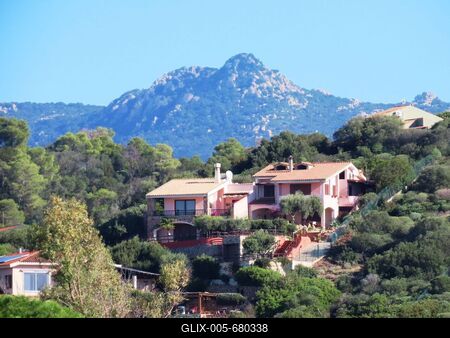 Houses among the mountains in the countryside of Capoterra - Sardinia - Italy-stock-foto