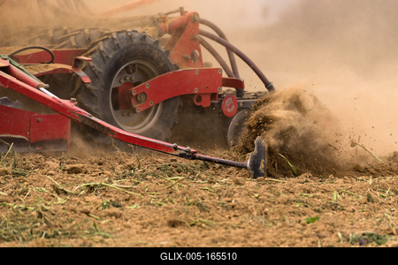 A farmer working on the field with a Horsch Pronto 4dc seeding drill.-stock-foto