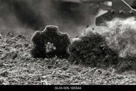 A farmer working on the field with a Horsch Pronto 4dc seeding drill. Black and white.-stock-foto