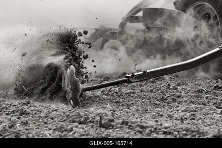 A farmer working on the field with a Horsch Pronto 4dc seeding drill. Black and white.-stock-foto
