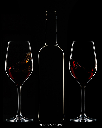 Red wine bottle and filled glasses-stock-foto