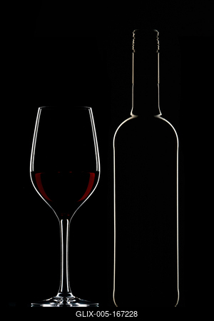 Red wine bottle and filled glass-stock-foto