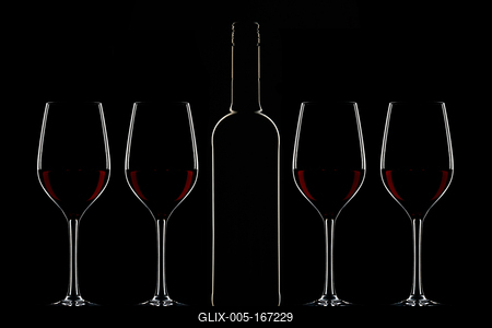 Red wine bottle and filled glass-stock-foto