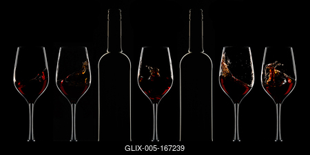 Red wine bottle and filled glass-stock-foto