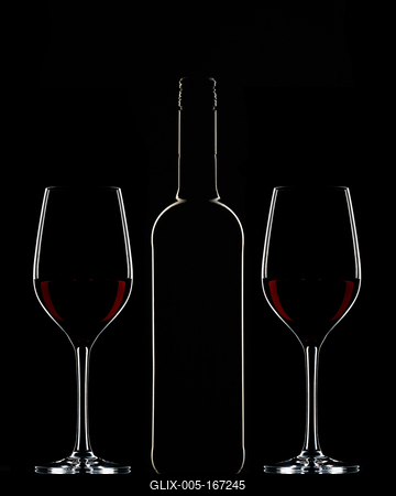 Red wine bottle and filled glass-stock-foto