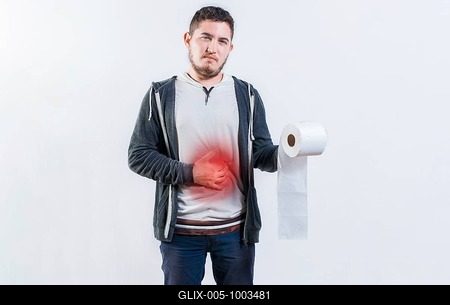 Person with diarrhea and stomach problems holding toilet paper. Man suffering with stomach pain holding roll of paper isolated-stock-foto