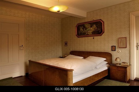1950s bedroom with nightstands and a religious picture hanging over the bed, Lauf an der Pegnitz, Middle Franconia, Bavaria, Germany, Europe-stock-foto